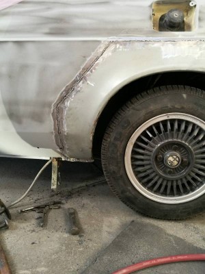 Progress on the nearside outer arch repair panel.