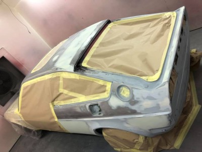 All carefully masked up ready for primer. Note anti-rust treatment to the roof repair.