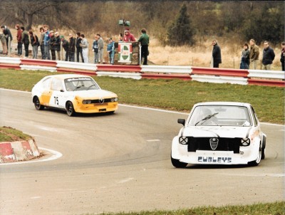 John Liddle leading me into the Mallory Park hairpin