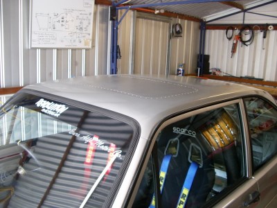 Sunroof option - new piece of metal with stepped edge, sealed in and 100 rivets - done!