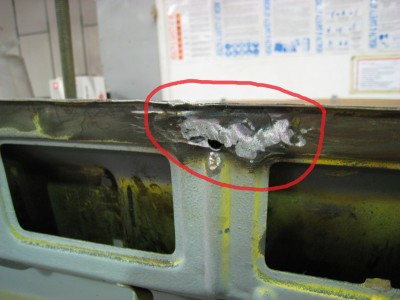 IMG_3005 Front inner valence flange poorly repaired.jpg