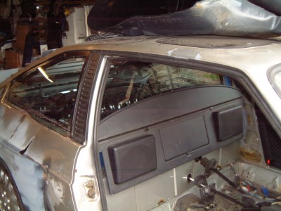 The 164 rear parcel shelf bridged the gap nicely - it also has two big speakers and two roller blinds to cover the glass!