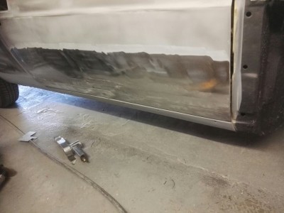 Repairs complete to lower door skin O/S